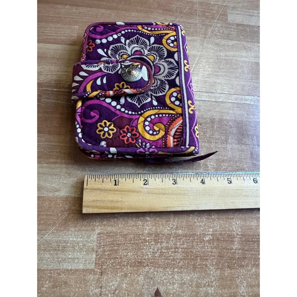 Vera Bradley Turnlock Wallet in the retired Safari Sunset pattern.